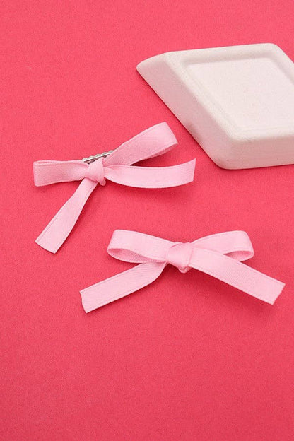 pink satin bow clips