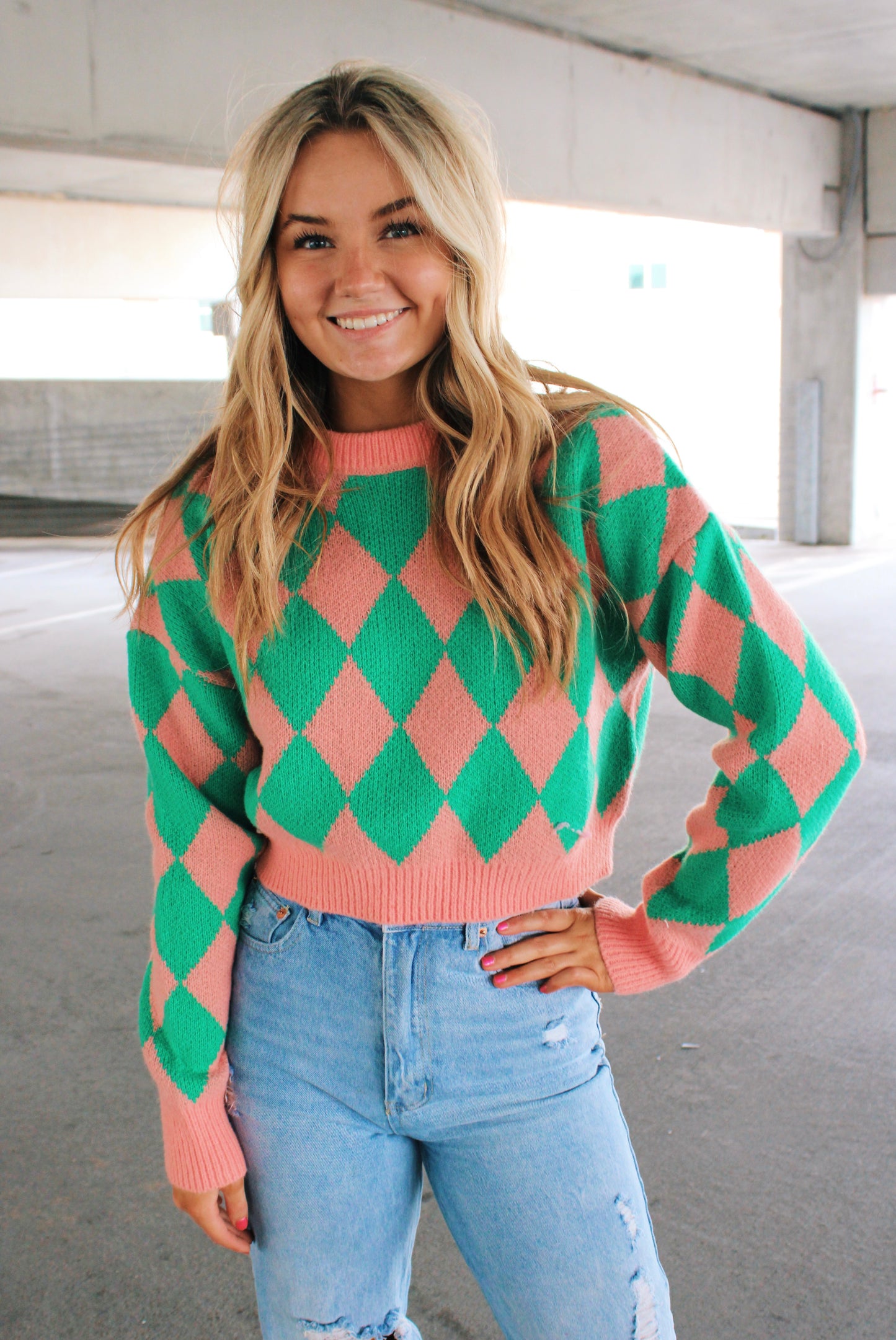 pink and green checkered sweater